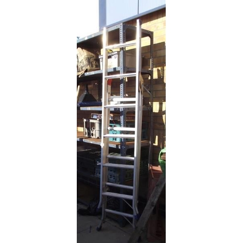 241 - An adjustable aluminium step ladder. COLLECT ONLY.