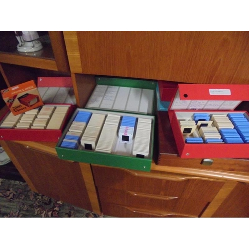 355 - Six boxes of slides and a viewer.