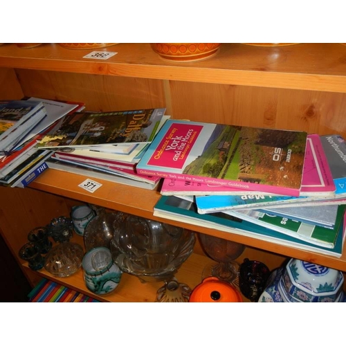 371 - A quantity of Ordnance survey maps and guide books.