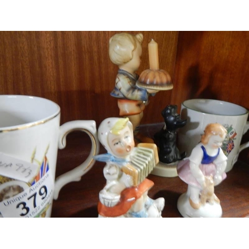 379 - A mixed lot of china figures etc.,