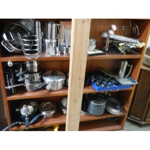 380 - A large mixed lot of metalware - teapots, pans etc.,