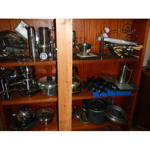 380 - A large mixed lot of metalware - teapots, pans etc.,