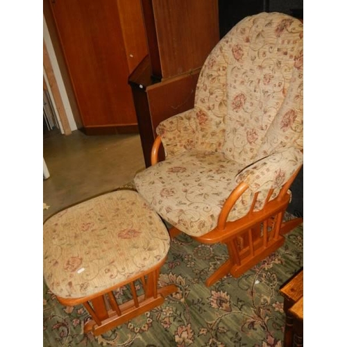 409 - A good quality rocking chair with stool.  COLLECT ONLY