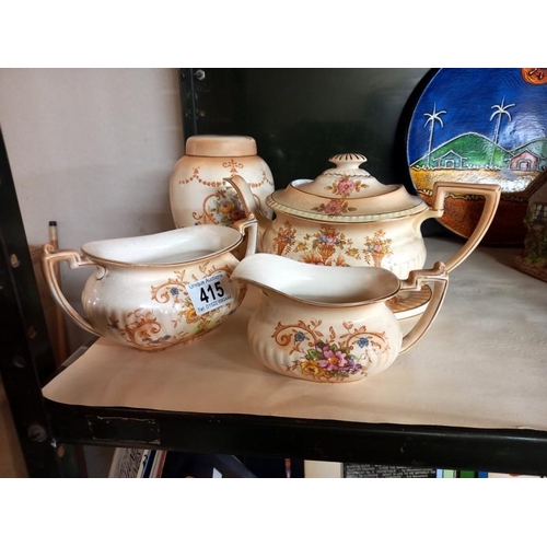 415 - A Crown Devon 3 piece tea set & a biscuit barrel