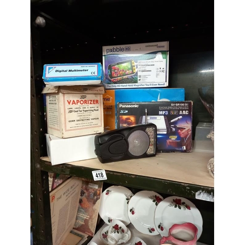 418 - A quantity of items including a Panasonic MP3 writer & hand held magnifier