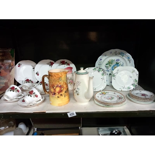 420 - A quantity of part tea sets including teapots