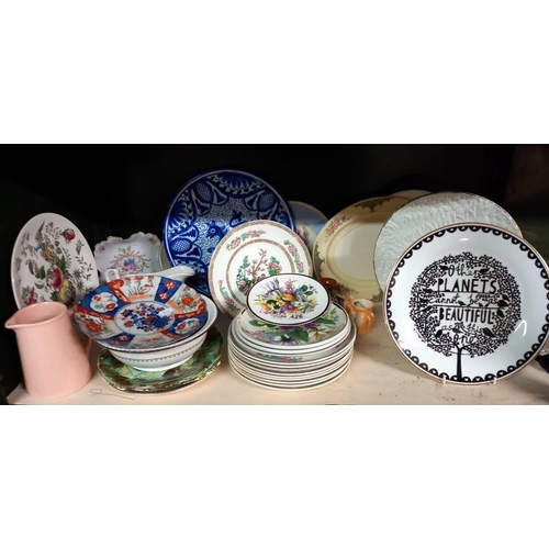 426 - A shelf of china including other planet plate by Rob Ryan