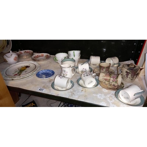 431 - A quantity of china part tea sets & plates etc.