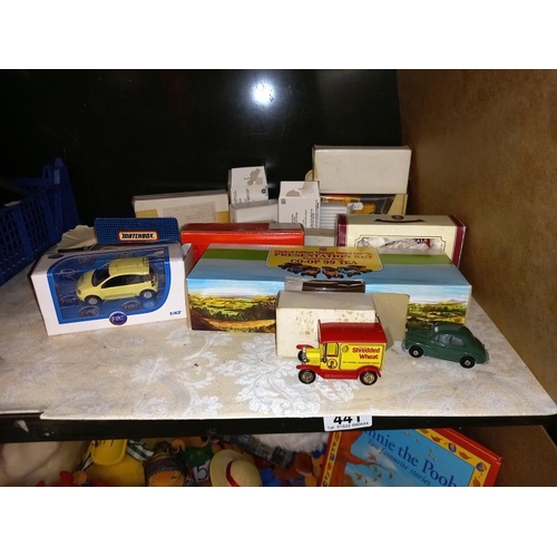 441 - A quantity of mixed boxed model cars including Matchbox etc.