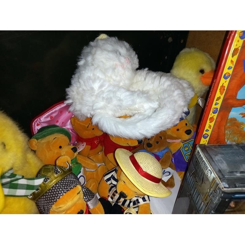 442 - A quantity of cuddly toys including Winnie The Pooh etc.