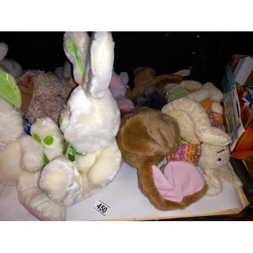 450 - A shelf of cuddly toys