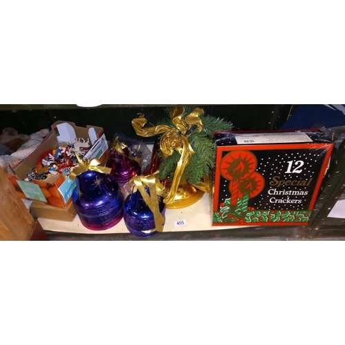 455 - A quantity of Christmas decorations including bell, tree, ornaments & crackers etc.