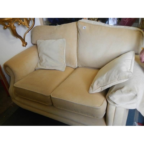 461 - A good two seat sofa on brass castors, COLLECT ONLY,.