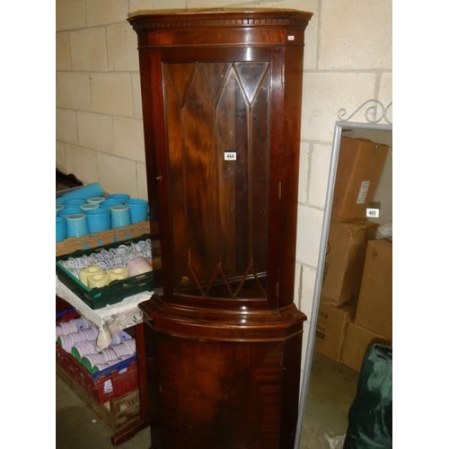 464 - A mahogany corner cabinet. COLLECT ONLY.