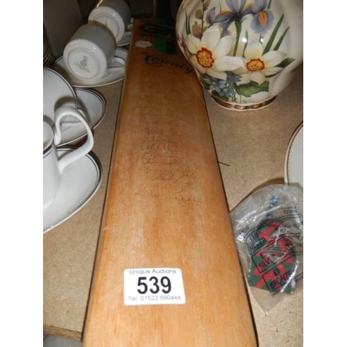 539 - A signed cricket bat.  COLLECT ONLY.