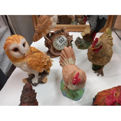 552 - A mixed lot of cockerel and owl figures, plus a grey parrot