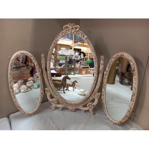 555 - An ornate triple dressing table mirror