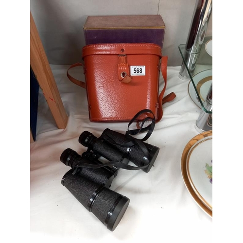 568 - A cased set of Hilka 10 x 50 binoculars