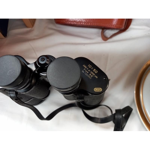 568 - A cased set of Hilka 10 x 50 binoculars