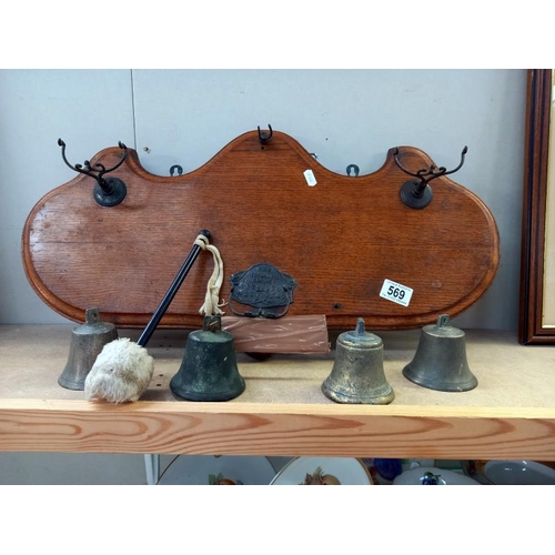 569 - A Victorian oak wall mounted brass bells titled The Westminster chimes with number sequence (bells n... 