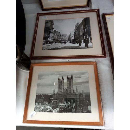 584 - A collection of framed and glazed Lincoln related photographs