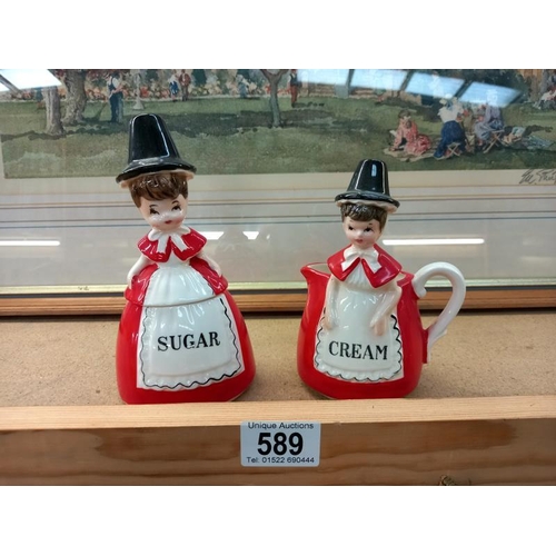 589 - Sugar bowl and cream jug of ladies in national Welsh costume