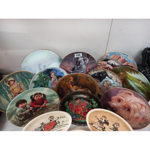 606 - A quantity of boxed collectors plates