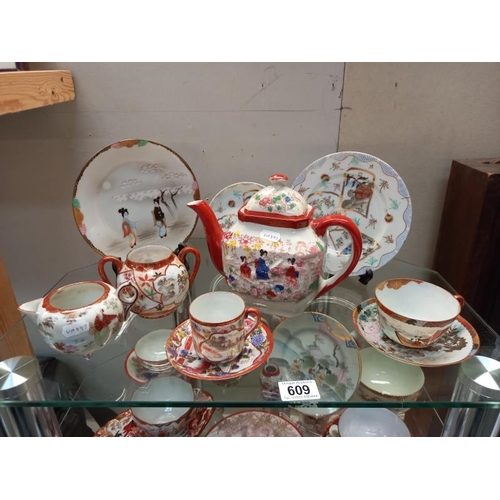 609 - A good lot of Chinese china including teapots, cup and saucers etc