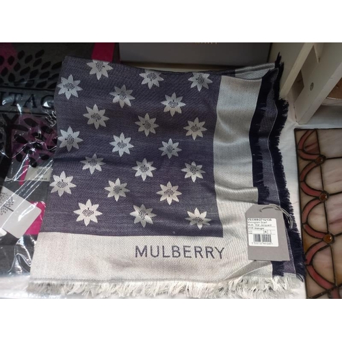 617 - A new boxed Mulberry monogram scarf, a new with tags Heritage scarf and a new purse all decorated wi... 