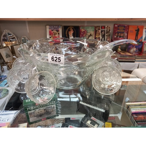 625 - A vintage moulded glass punch bowl with ladle, hooks and 8 punch glasses