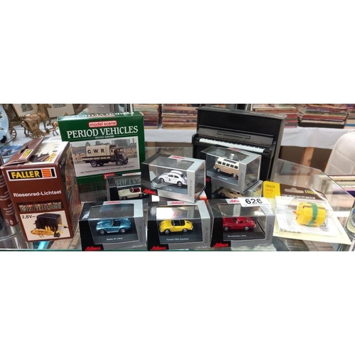 626 - 8 boxed Schuco 1/87 scale model cars including Porsche, Mercedes, A C Cobra etc and piano money box ... 