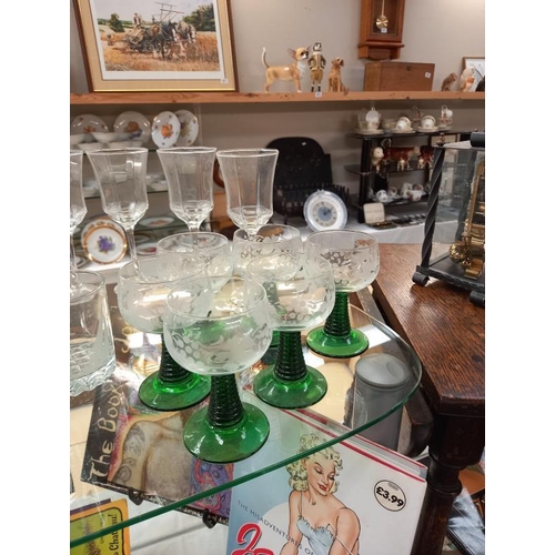 637 - A quantity of various drinking glasses and set of dessert bowls