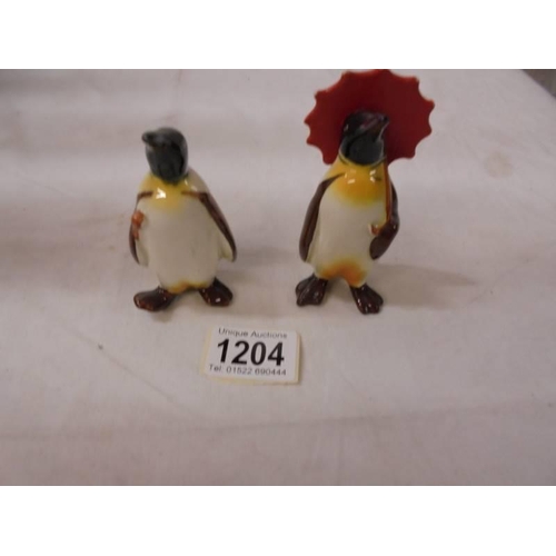 1204 - Two Beswick penguins.