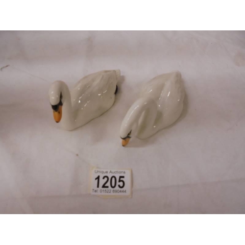 1205 - Two Beswick swans.