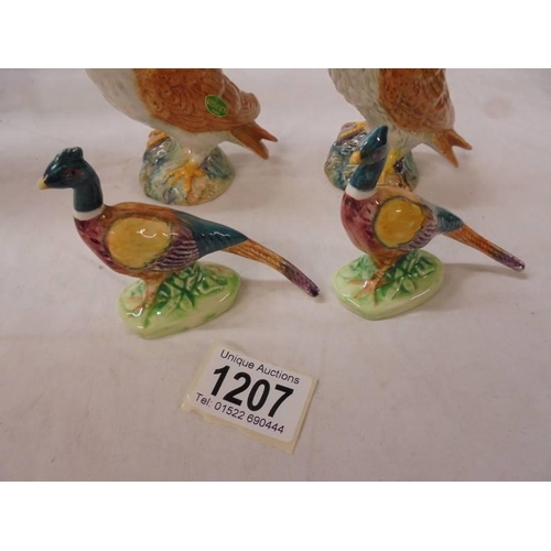 1207 - Two Beswick owls and two pheasants, (one owl has small chip on wing).