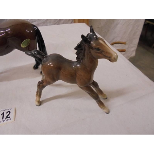 1212 - Three Beswick horses.