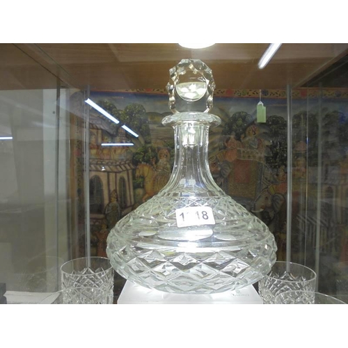 1218 - A good quality cut glass ship's decanter with a set of six cut glass whisky goblets. COLLECT ONLY.