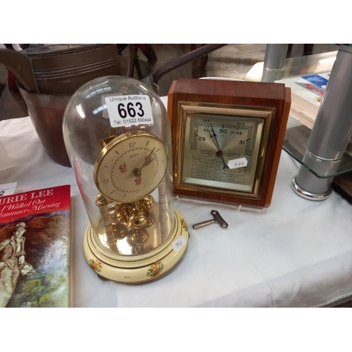 663 - A Bentima floral pattern anniversary clock under glass dome and a vintage barometer.