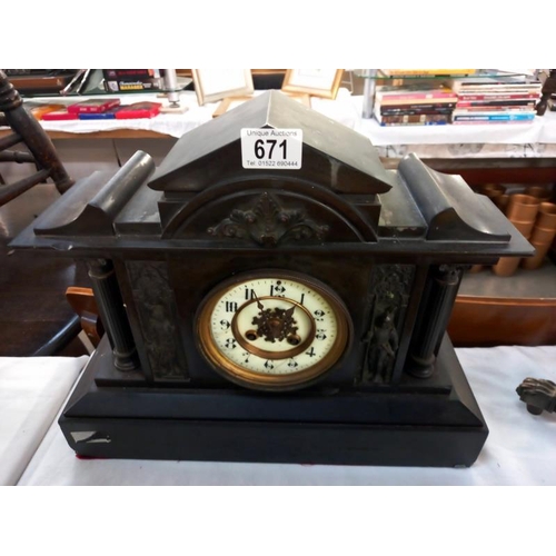 671 - An old style mantel clock, springs ok. (no key or pendulum)