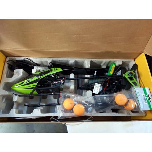 672 - A boxed E Sky honey bee V2 RC helicopter. Looks complete, untested/ unchecked.