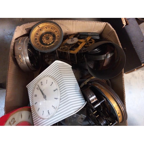 686 - A selection of old clock parts, movements spares and repairs.