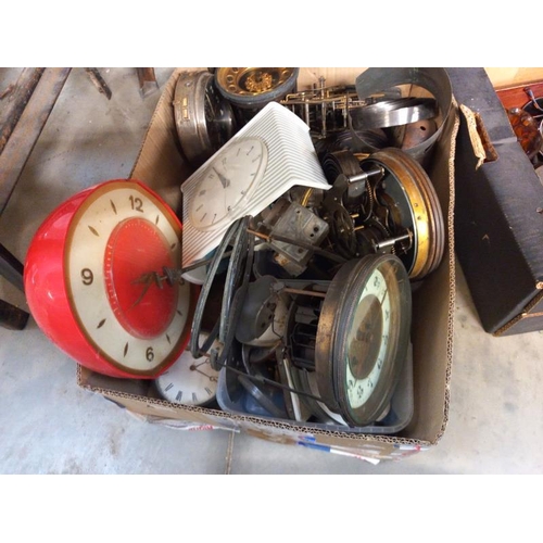 686 - A selection of old clock parts, movements spares and repairs.