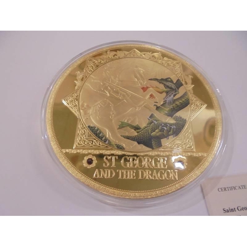 1158 - A large Saint George and the Dragon commemorative coin with certificate.