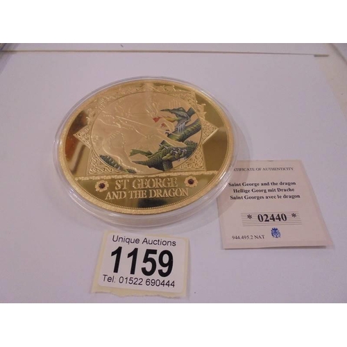 1159 - A large Saint George and the Dragon commemorative coin with certificate.