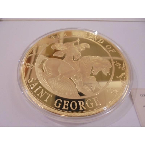 1159 - A large Saint George and the Dragon commemorative coin with certificate.