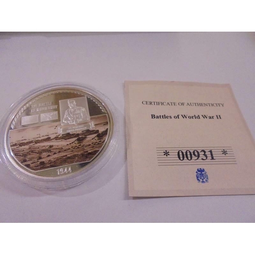 1160 - Six WW2 commemorative coins - Attack on Pearl Harbour, The Sinking of the Bismarck, Operatoin Overlo... 