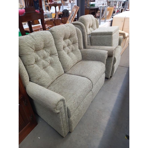 745 - A green fabric 2 seater settee, chair and foot stool