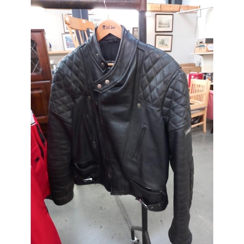 819 - An Ashman cowhide motorcycle jacket size UK44 and trousers size 36