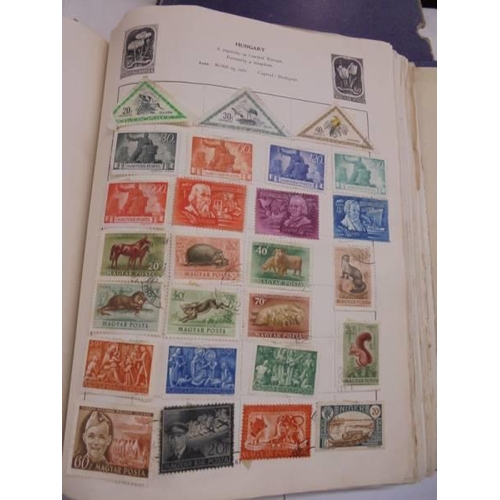 1175 - An album of postage stamps including six penny reds.