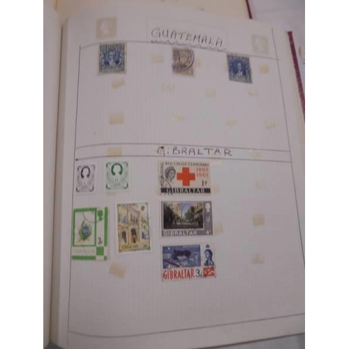 1178 - Three good stamp albums.